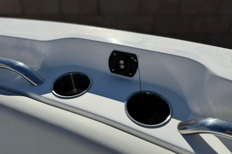 Slide: The Image of 2021 Sea Fox 268 Commander boat cup holders and control panel detail. - 18