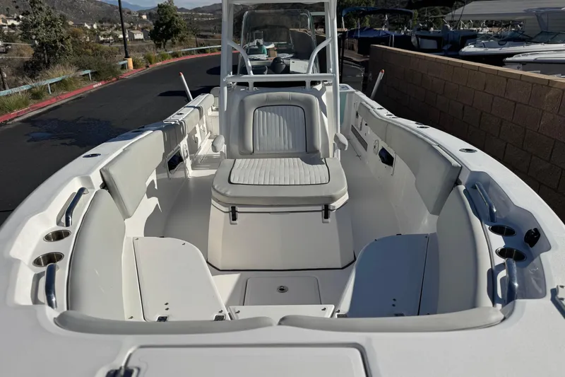 Slide: The Image of 2021 Sea Fox 268 Commander boat interior with seating and cup holders. - 21