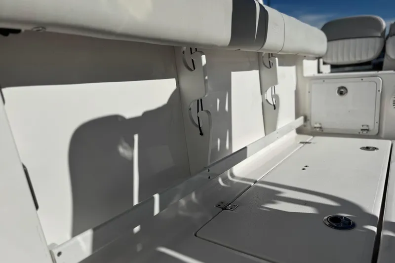 Slide: The Image of 2021 Sea Fox 268 Commander boat interior with seating and storage compartments. - 26