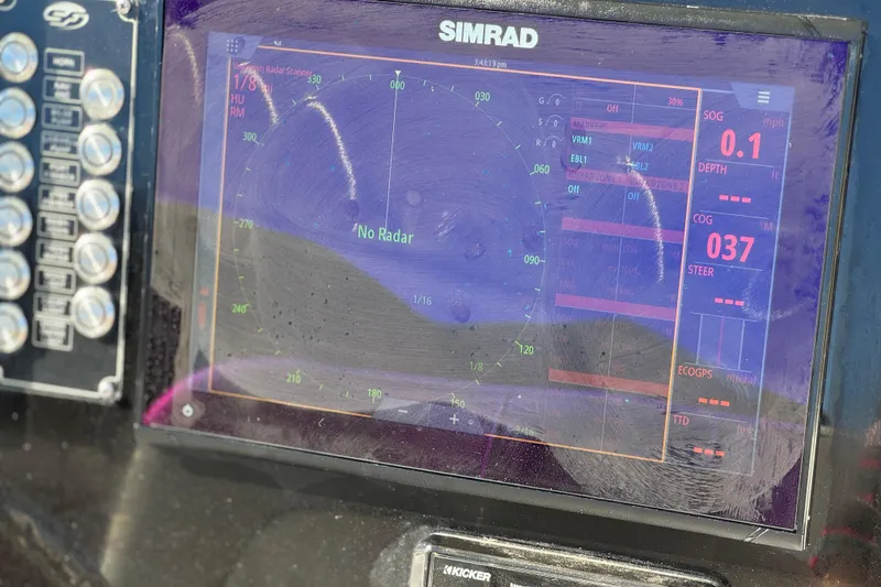 Slide: The Image of Simrad navigation display on 2021 Sea Fox 268 Commander boat, showing radar and GPS data. - 48