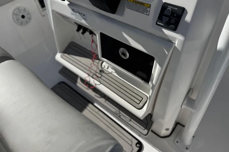 Slide: The Image of Interior view of 2021 Sea Fox 268 Commander boat console with storage compartment. - 49