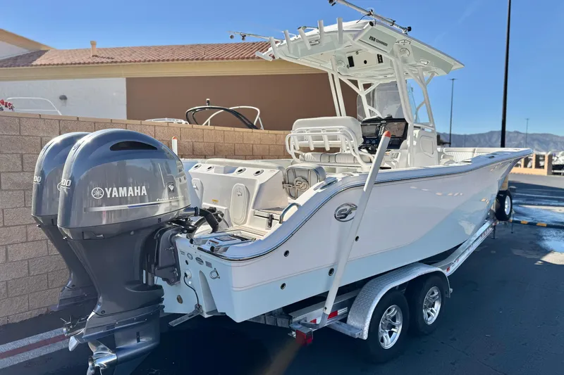 Slide: The Image of 2021 Sea Fox 268 Commander boat with dual Yamaha engines on a trailer. - 5