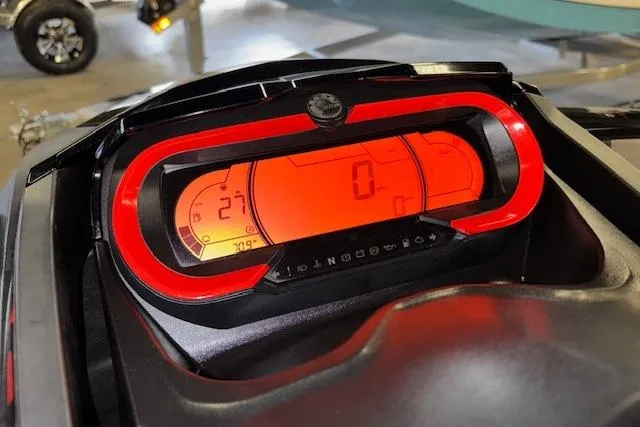 Slide: The Image of 2020 Sea-Doo RXT-X 300 dashboard with digital display and red accents. - 13
