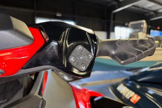 Slide: The Image of 2020 Sea-Doo RXT-X 300 handlebar controls in a showroom setting. - 18