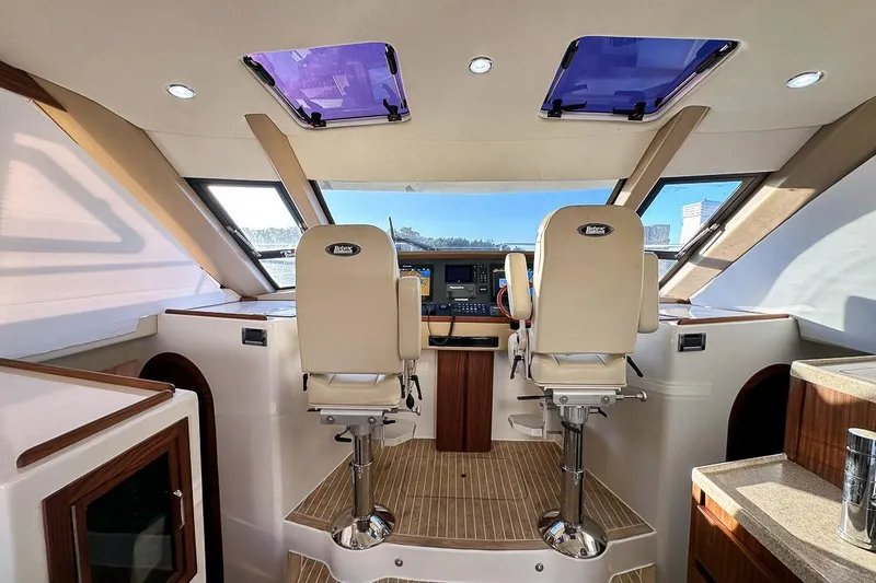 Slide: The Image of Helm station with dual captain chairs - 12