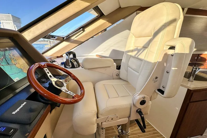 Slide: The Image of Leather captain's chair and wooden steering wheel - 13