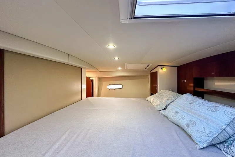 Slide: The Image of Dual access to the master berth, with wall space available for a TV if desired - 21
