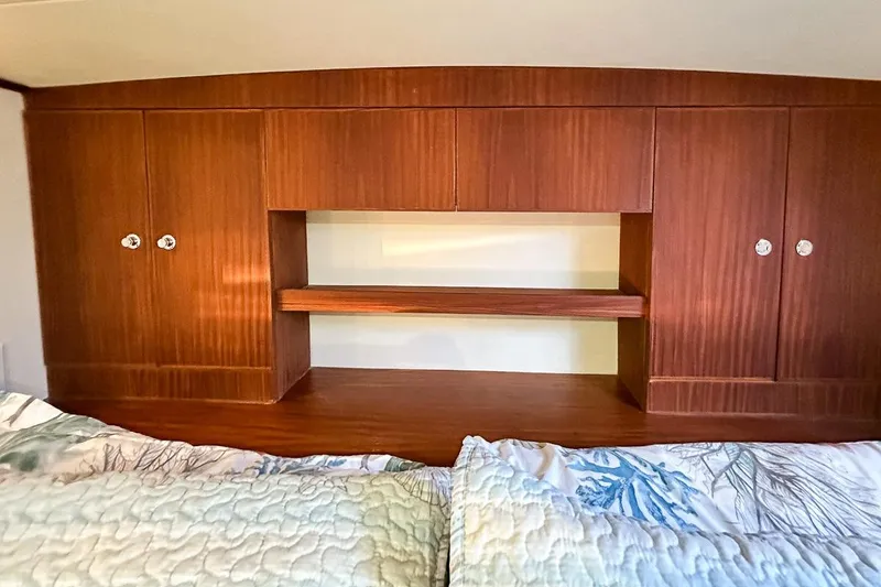 Slide: The Image of Chestnut brown built in shelves headboard - 22