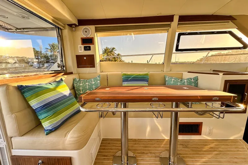 Slide: The Image of Comfortable salon dining with L shaped seating and scenic window views - 8