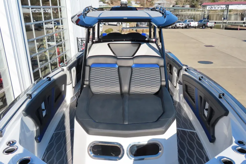 Slide: The Image of 2021 Sunsation Powerboats 40CCX interior with sleek seating and modern design. - 4