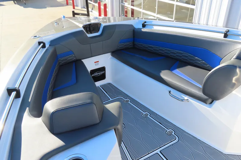 Slide: The Image of 2021 Sunsation Powerboats 40CCX interior with blue and gray seating, modern design. - 5