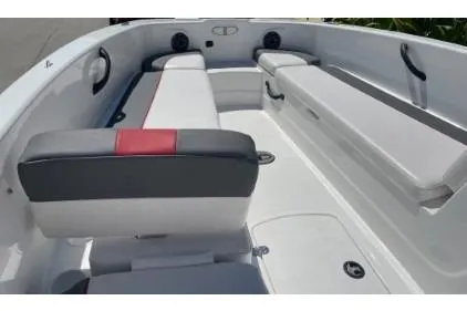 Slide: The Image of 2024 Tahoe T18 boat interior with cushioned seating and modern design. - 3