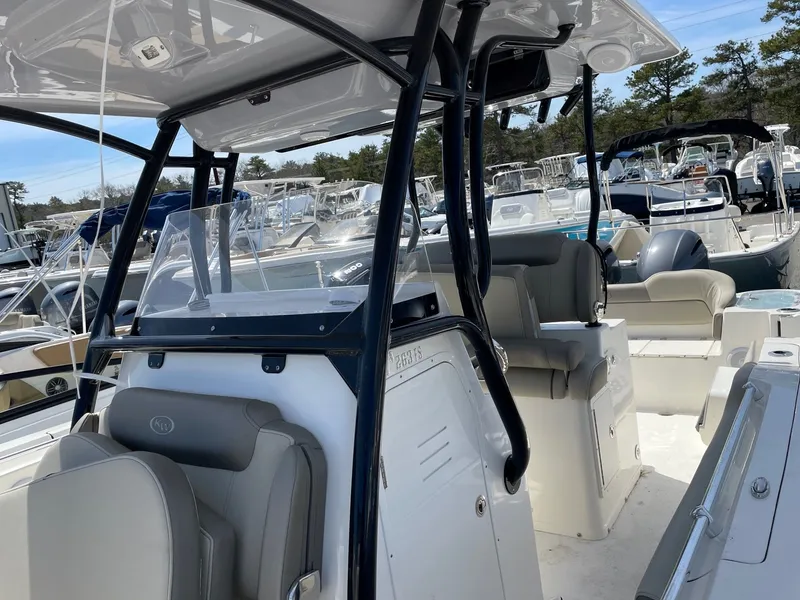 Slide: The Image of Interior view of a 2023 Key West 263 FS boat in marina. - 12