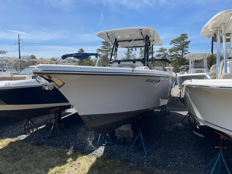 Slide: The Image of 2023 Key West 263 FS boat on stands outdoors. - 3