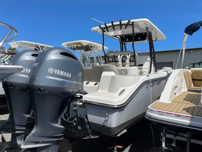 Slide: The Image of 2023 Key West 263 FS boat with Yamaha engines outdoors. - 4