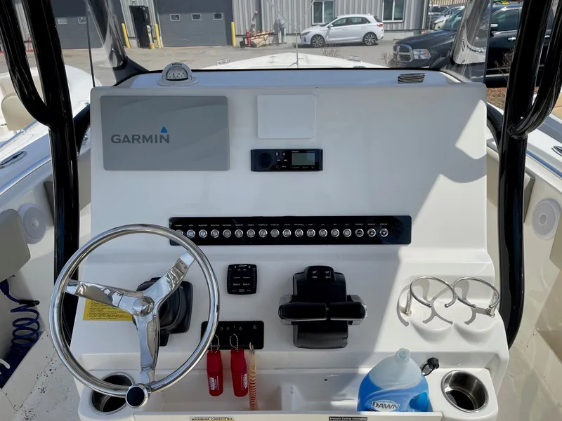 Slide: The Image of Key West 263 FS boat console, 2023 model, featuring Garmin system. - 6