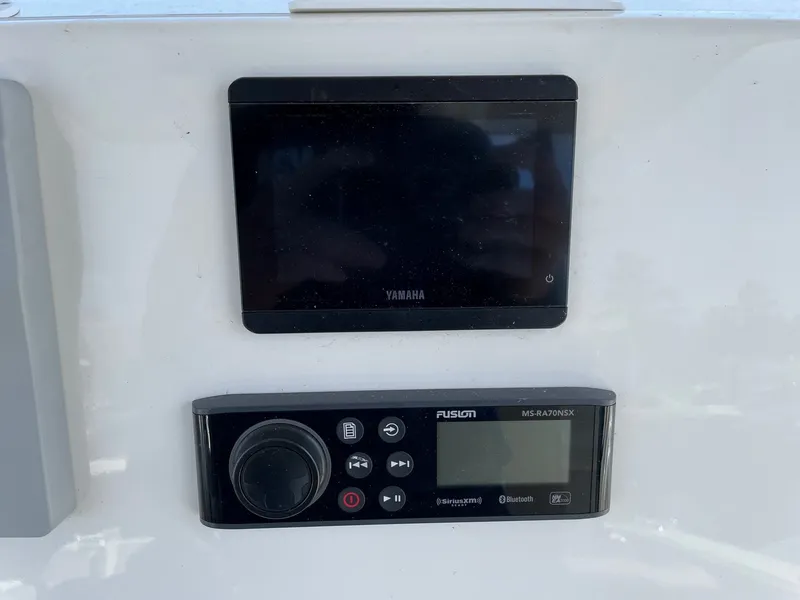 Slide: The Image of Yamaha and Fusion controls on Key West 263 FS boat, 2023 model. - 8