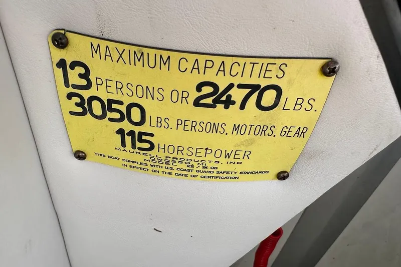 Slide: The Image of Capacity plate for 2004 Crest 2200 Family DL boat, 13 persons, 2470 lbs, 115 horsepower. - 24