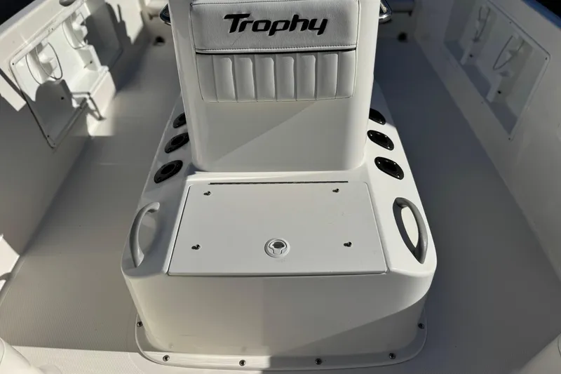 Slide: The Image of 2021 Trophy T21 Bay boat interior with seating and storage compartments. - 13