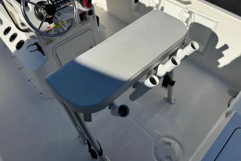 Slide: The Image of 2021 Trophy T21 Bay boat interior with steering wheel and rod holders. - 17