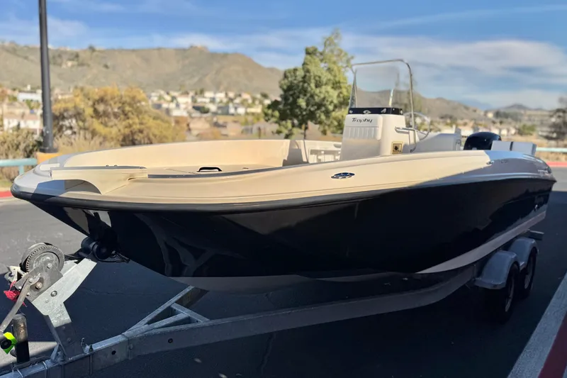 Slide: The Image of 2021 Trophy T21 Bay boat on trailer, scenic background, sunny day. - 3