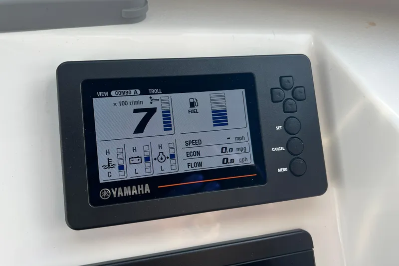 Slide: The Image of Yamaha display on 2022 Parker 2320 Sport Cabin showing engine metrics and fuel data. - 16