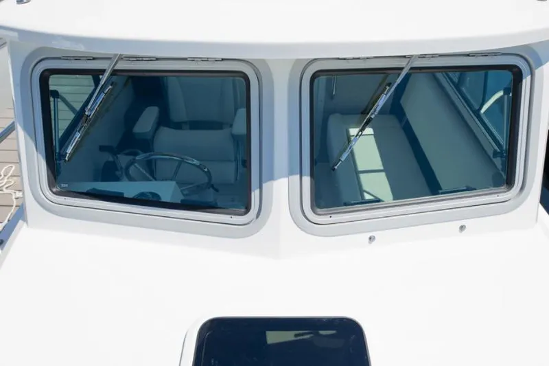 Slide: The Image of Manufacturer Provided Image: 2022 Parker 2320 Sport Cabin boat windshield and cabin interior. - 32