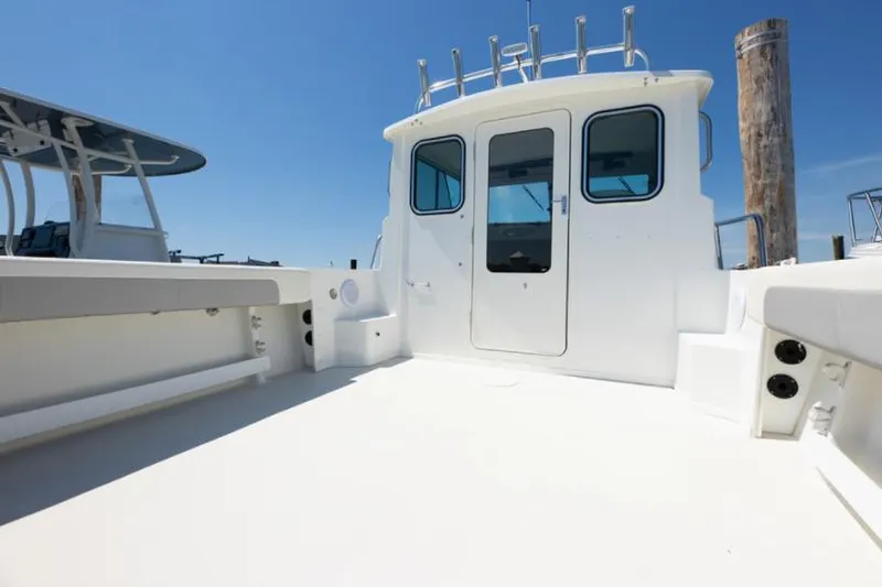Slide: The Image of Manufacturer Provided Image: 2022 Parker 2320 Sport Cabin boat deck with cabin door. - 33