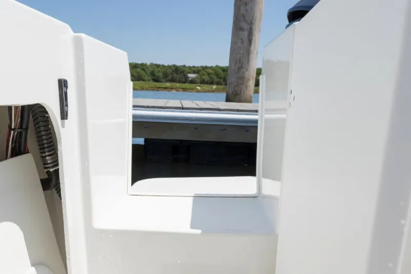 Slide: The Image of Manufacturer Provided Image: Parker 2320 Sport Cabin 2022 boat interior view with open hatch. - 38