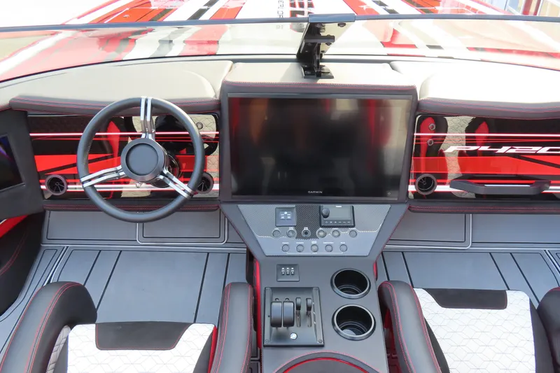 Slide: The Image of Interior of 2025 Performance Powerboats P420 with modern dashboard and steering wheel. - 14