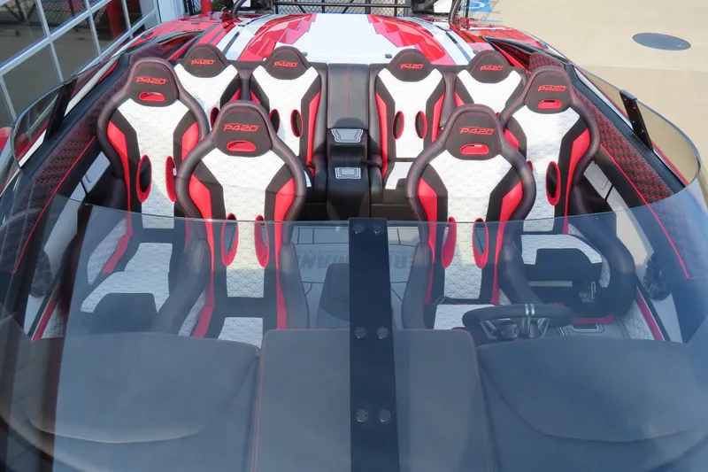 Slide: The Image of 2025 Performance Powerboats P420 interior with red and white racing seats. - 15