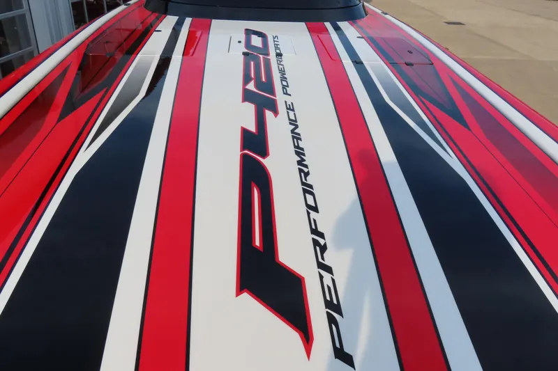 Slide: The Image of 2025 Performance Powerboats P420 with bold red, black, and white graphics. - 16