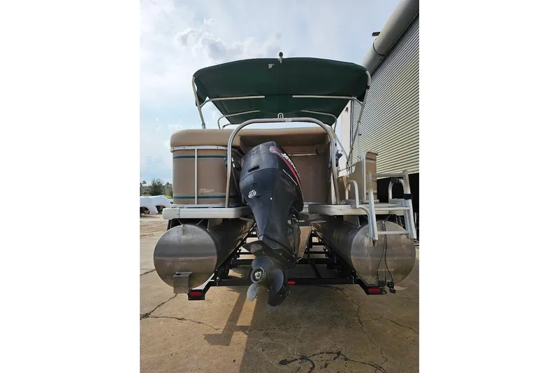 Slide: The Image of 2004 Parti Kraft Admiral 240 RE pontoon boat with outboard motor, rear view. - 15
