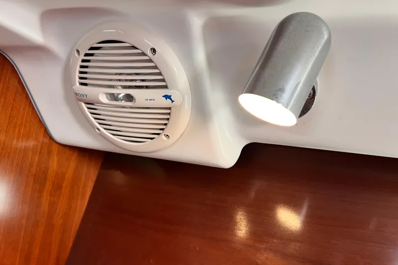 Slide: The Image of Interior of 2005 Beneteau 343 with Sony speaker and spotlight on wooden panel. - 27