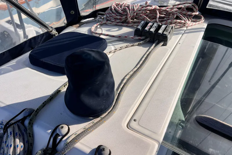 Slide: The Image of Deck of 2005 Beneteau 343 sailboat with ropes and cleats. - 50