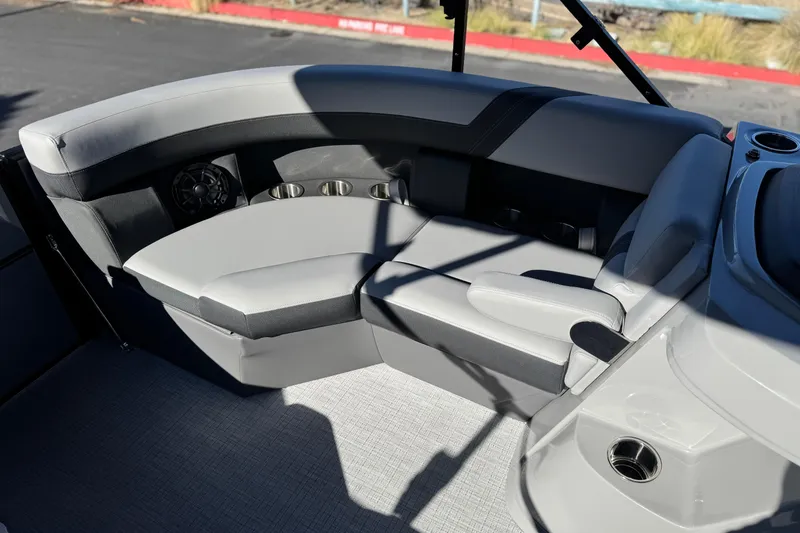 Slide: The Image of Luxurious seating on 2026 Berkshire 22UL CTS boat, featuring sleek design and cup holders. - 12