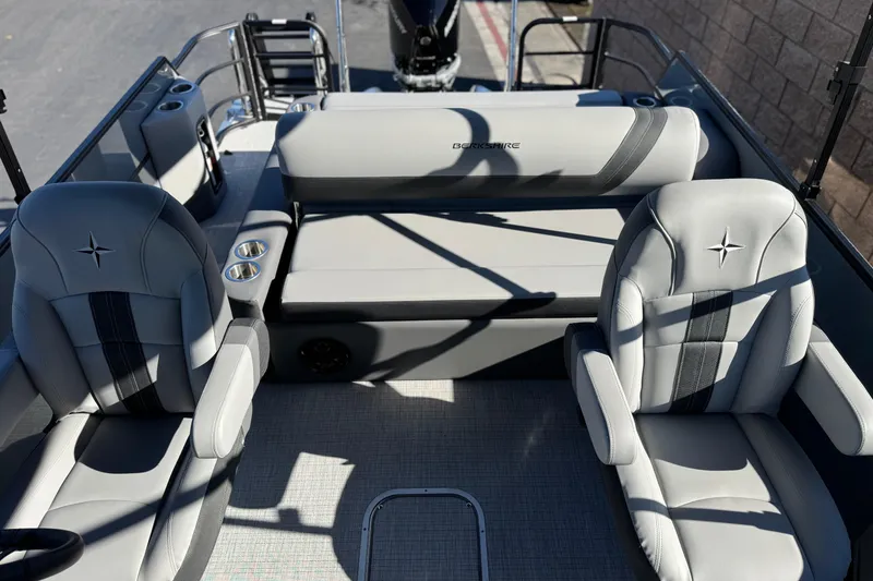 Slide: The Image of 2026 Berkshire 22UL CTS boat interior with luxurious seating and cup holders. - 16