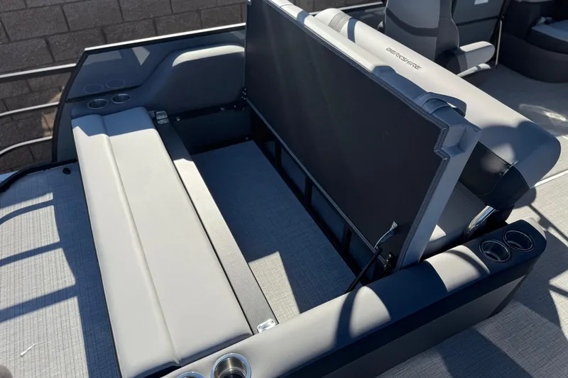 Slide: The Image of 2026 Berkshire 22UL CTS boat interior with adjustable seating and cup holders. - 20
