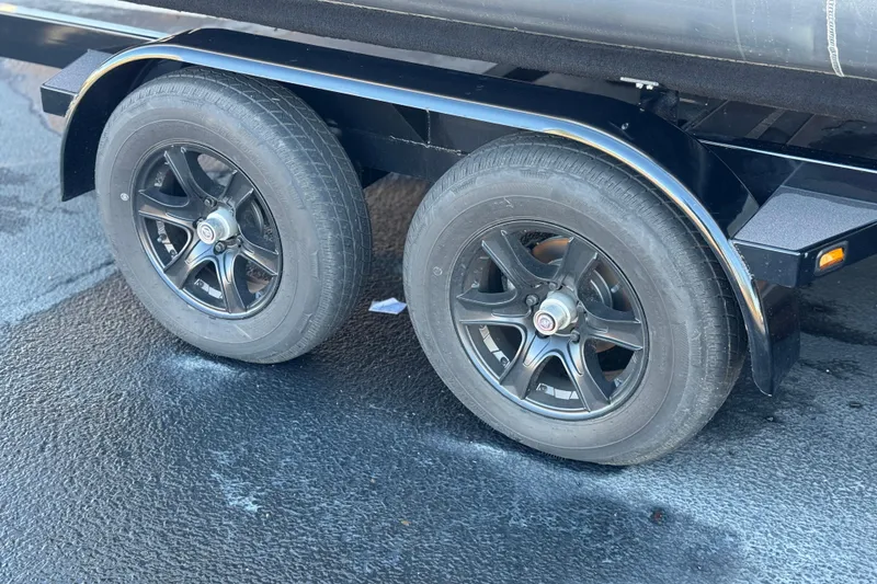 Slide: The Image of Dual black wheels on a 2026 Berkshire 22UL CTS trailer. - 28