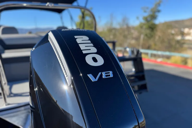 Slide: The Image of Close-up of a 2026 Berkshire 22UL CTS boat's V8 engine in sunlight. - 8