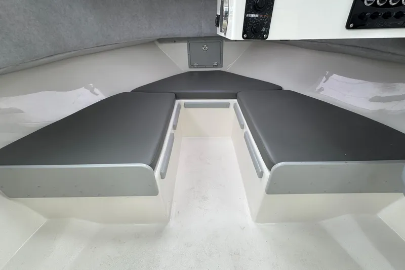 Slide: The Image of Interior cabin of 2026 Defiance Admiral 220 EX boat with cushioned seating. - 49
