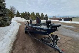 Slide: The Image of 2022 Ranger VS1665T boat dashboard with Lowrance fish finder and control panel. - 7