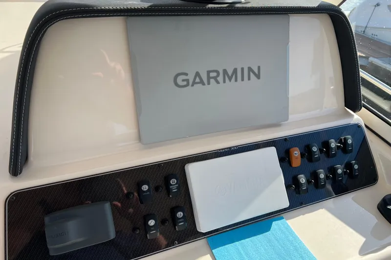 Slide: The Image of Dashboard of 2021 Grady-White Marlin 300 with Garmin navigation system. - 14