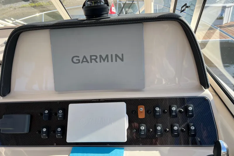 Slide: The Image of Dashboard of 2021 Grady-White Marlin 300 with Garmin navigation system. - 15