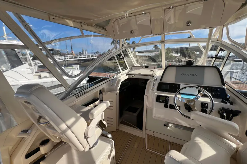 Slide: The Image of 2021 Grady-White Marlin 300 boat interior with Garmin navigation system. - 7