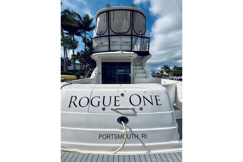 Slide: The Image of 2003 Sea Ray 560 Sedan Bridge yacht named "Rogue One" docked in Portsmouth, RI. - 17