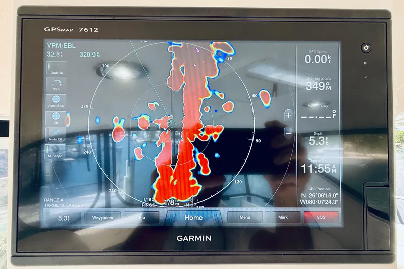 Slide: The Image of Garmin GPSMAP 7612 display on 2003 Sea Ray 560 Sedan Bridge, showing radar and navigation data. - 34