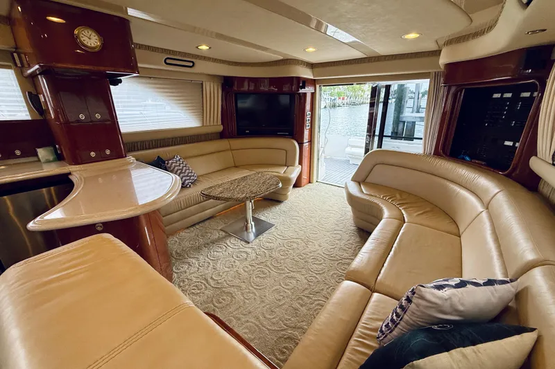 Slide: The Image of Luxurious interior of 2003 Sea Ray 560 Sedan Bridge yacht with plush seating and elegant decor. - 42