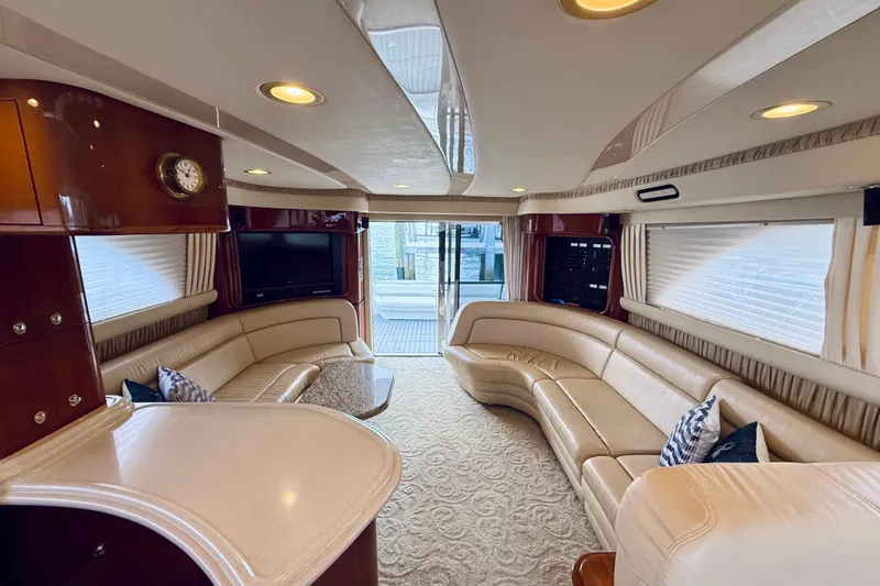 Slide: The Image of Luxurious interior of 2003 Sea Ray 560 Sedan Bridge yacht with elegant seating and decor. - 43