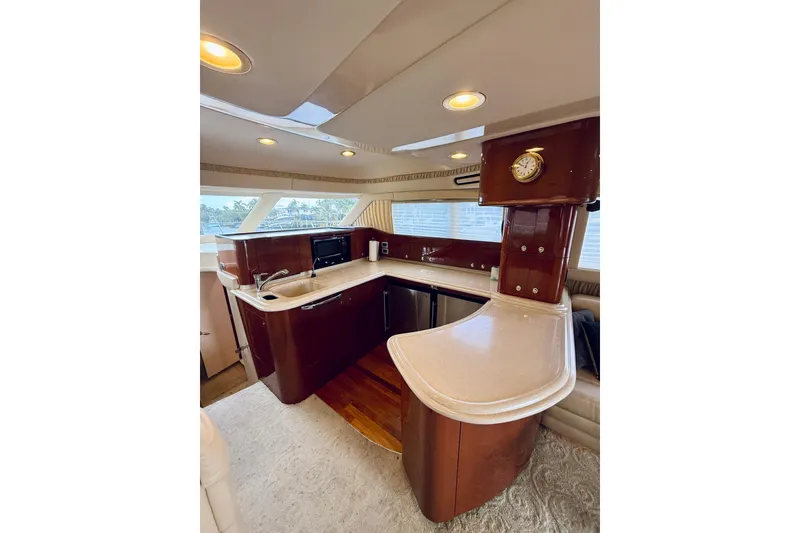 Slide: The Image of Luxurious 2003 Sea Ray 560 Sedan Bridge yacht interior with modern kitchen amenities. - 47